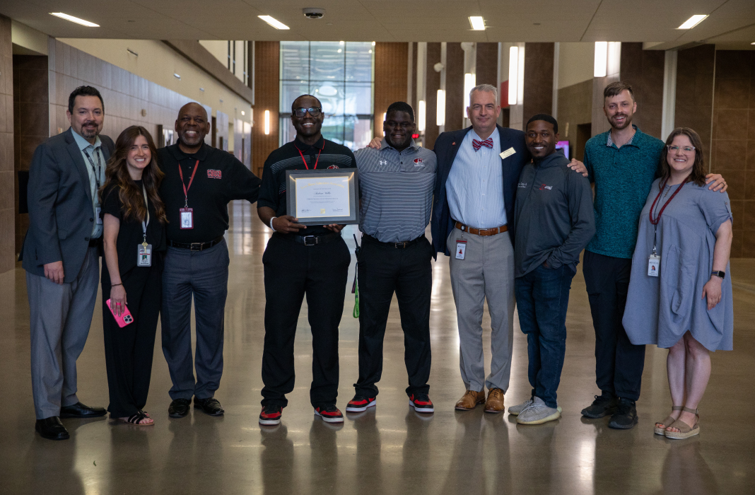 Braswell High Staff with Award